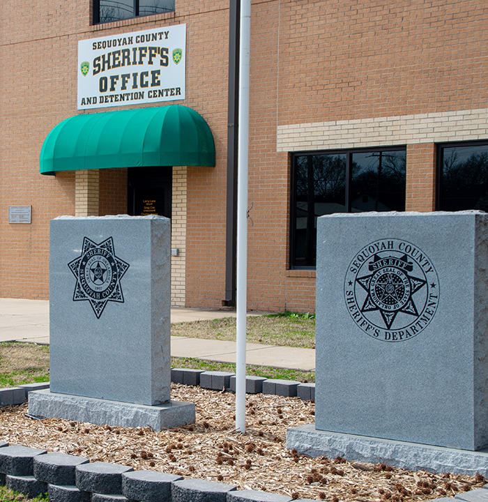 memorial plaques in front of the sequoyah county sheriff's office